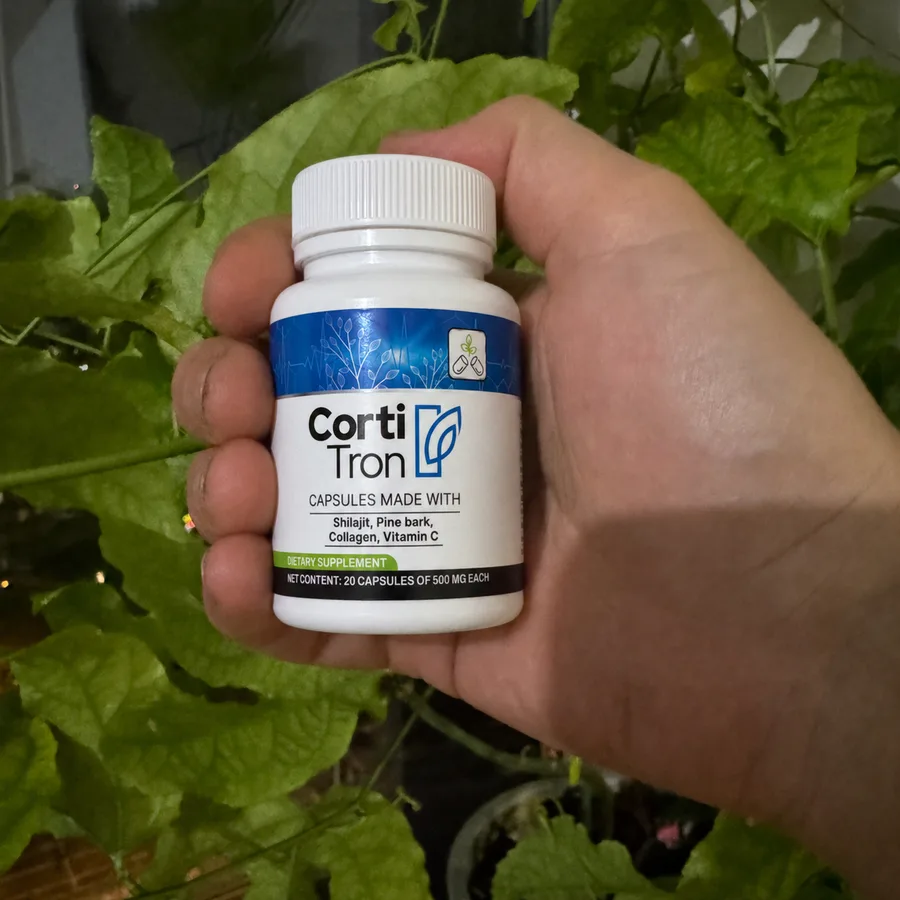 CortiTron bottle held in hand, real unedited photo